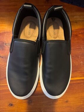 Maurices Black Slip-On Sneakers with White Soles